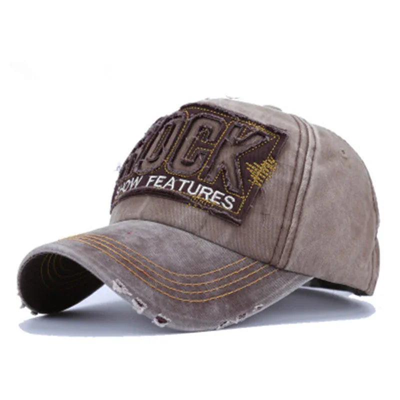 Distressed brown baseball cap with yellow stitching and embroidered patch reading 'LUCK' and 'SHOW FEATURES'