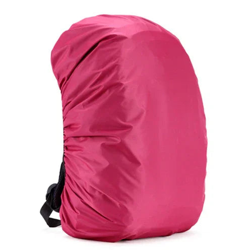 Pink waterproof backpack cover with elastic edges on a white background