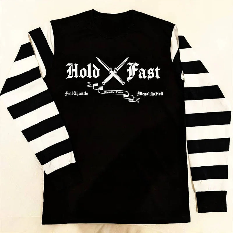 Black long-sleeve shirt with white striped sleeves and Hold Fast graphic with crossed knives