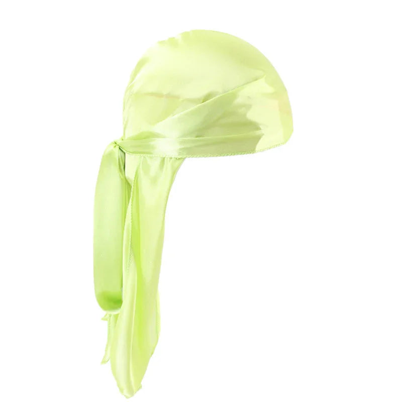 Light green satin durag with long tail tied at the side on white background