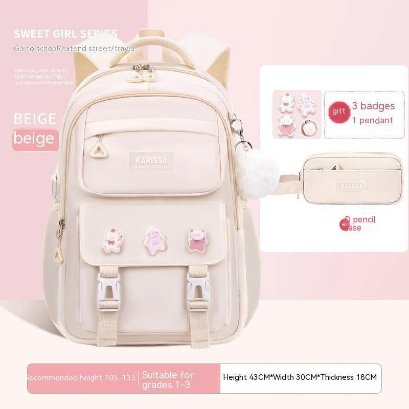 Beige Karissa school backpack for girls with cartoon badges and matching pencil case