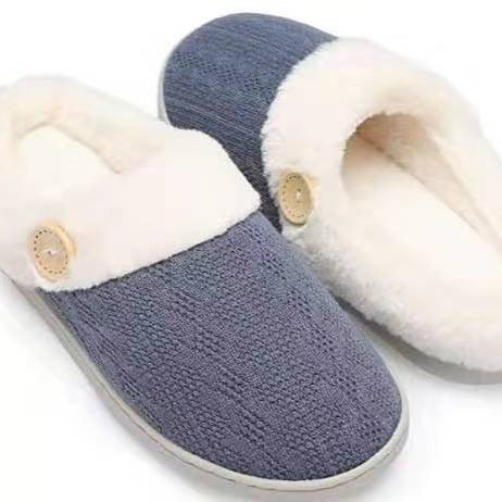 Cozy blue slippers with white plush lining and button detail, perfect for indoor comfort