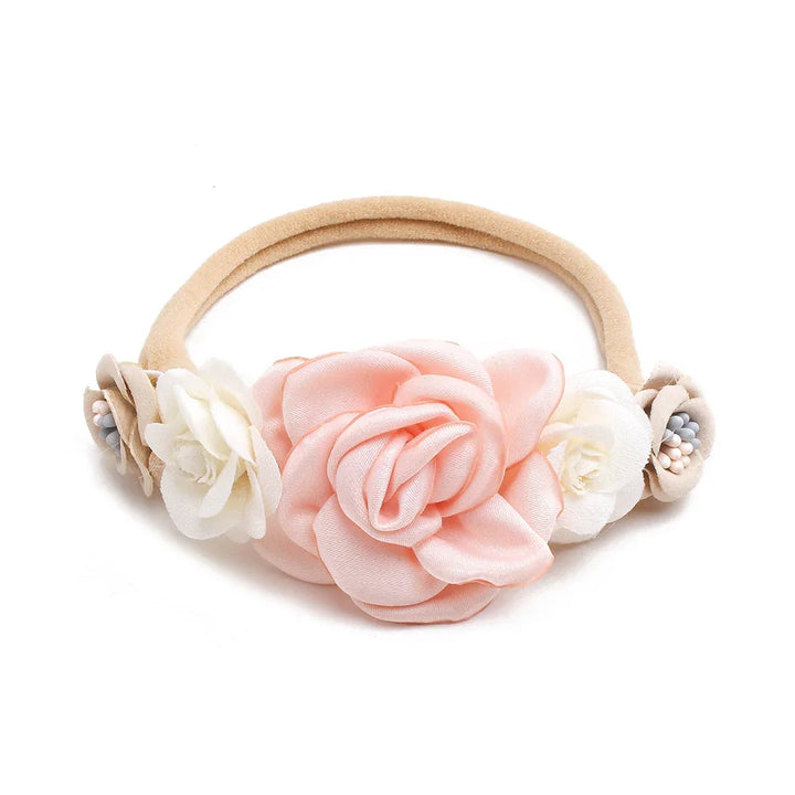Beige fabric headband with pink and white silk rose flowers and decorative buds