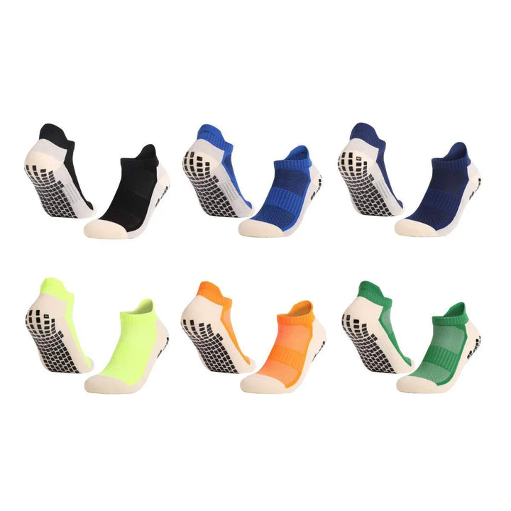 Set of colorful non-slip ankle socks with rubber grips in black, blue, neon yellow, orange, and green