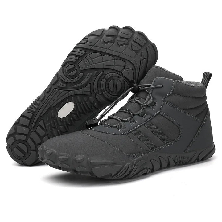 Black waterproof hiking shoes with rugged non-slip sole and quick lace system on white background