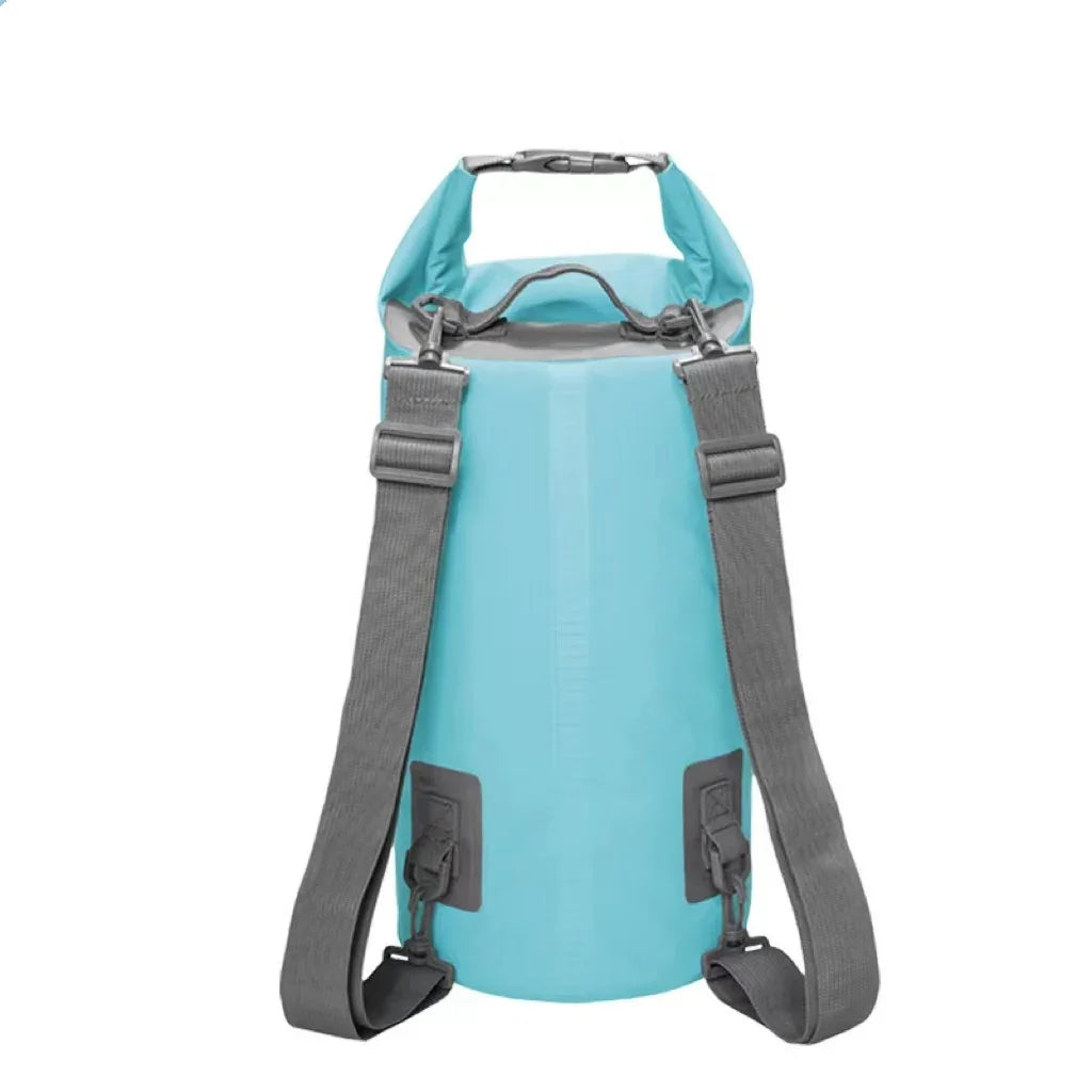 Blue waterproof dry bag backpack with gray adjustable straps on white background