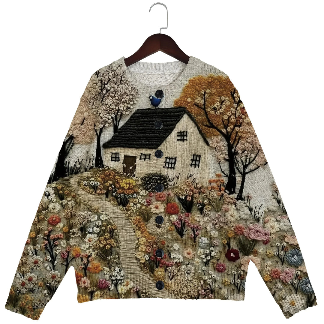 Buttoned knitted cardigan with embroidered cottage, flowers, and autumn trees design