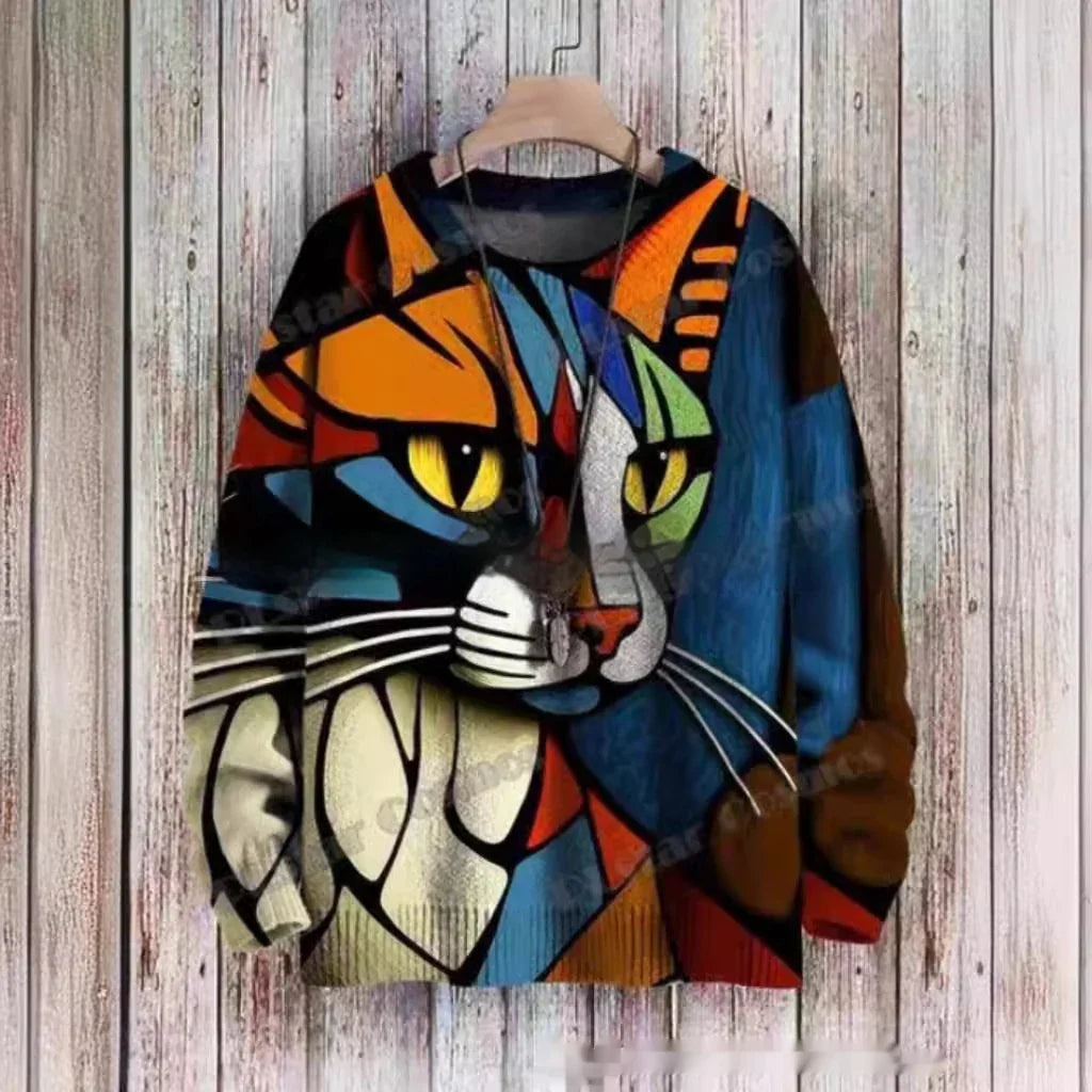 Colorful abstract cat face sweatshirt hanging on wooden wall background