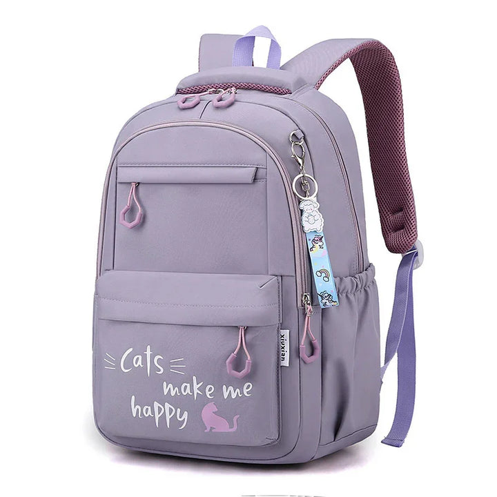 Purple backpack with front pocket, cat design and text 'cats make me happy', keychain attached