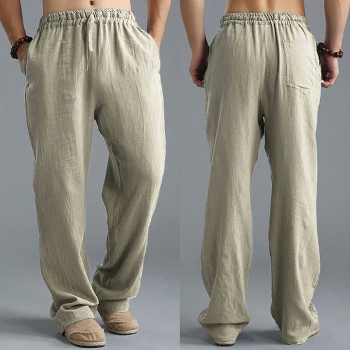 Front and back view of casual loose beige linen pants with elastic waistband and pockets
