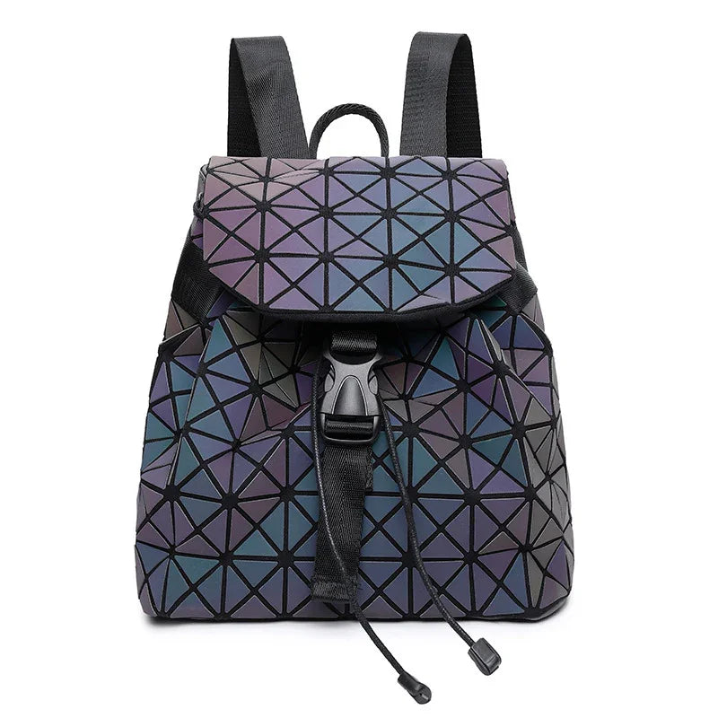 Geometric patterned backpack with purple and blue reflective triangular panels, black straps, and front buckle closure