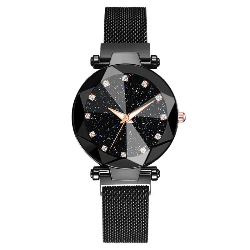 Black starry dial wristwatch with rose gold hands and diamond hour markers on black mesh band