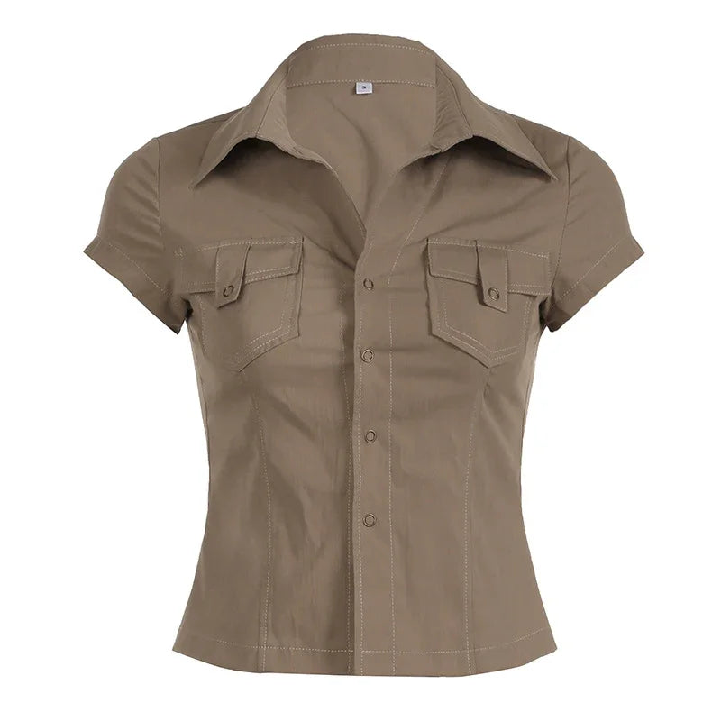 Tan short-sleeve button-up women's shirt with collar and two front flap pockets