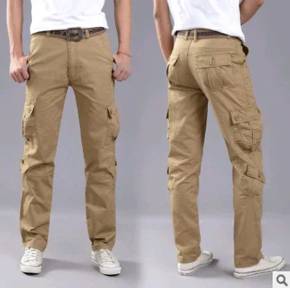 Men's beige cargo pants with multiple pockets, worn with white sneakers and belt, front and back views