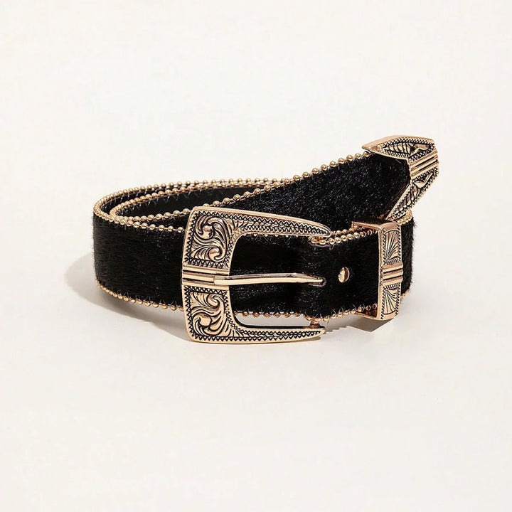 Black leather belt with engraved gold-tone buckle and beaded edges on white background
