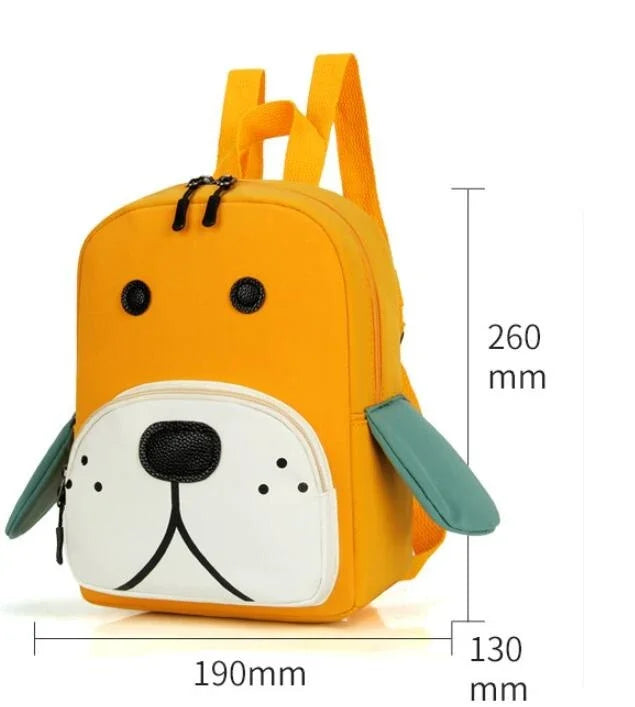 Yellow kids backpack designed like a dog's face with green ears and front pocket, size 260x190x130 mm