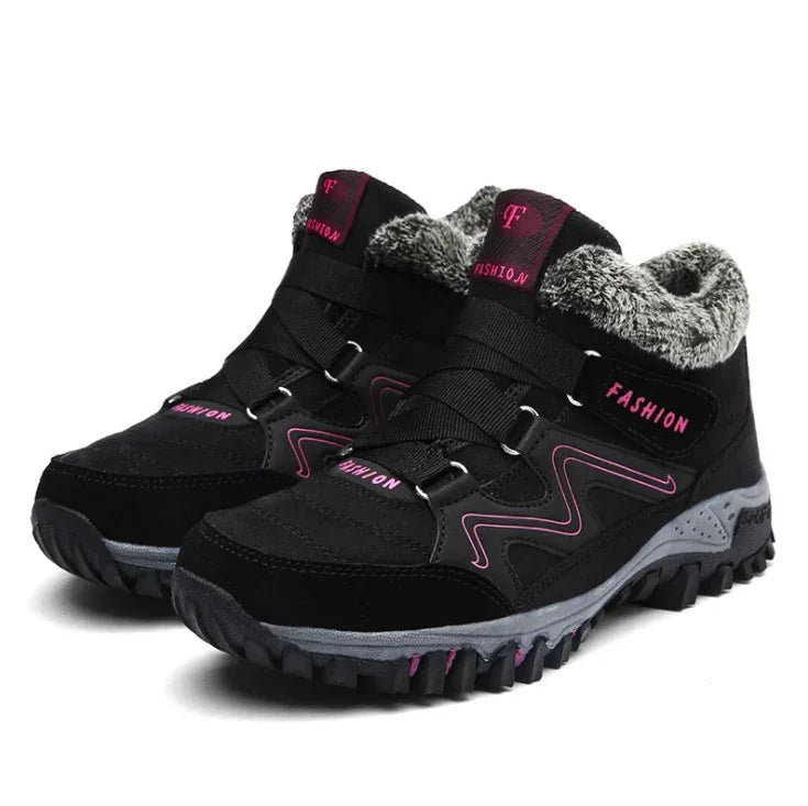 Black and pink winter hiking boots with faux fur lining and rugged sole