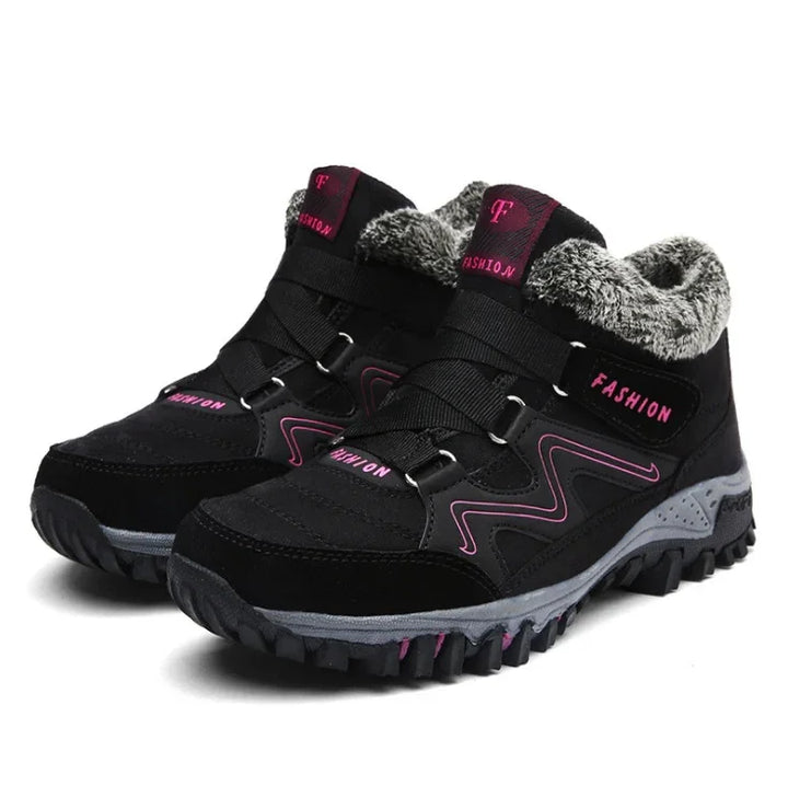 Black and pink winter hiking boots with faux fur lining and rugged sole