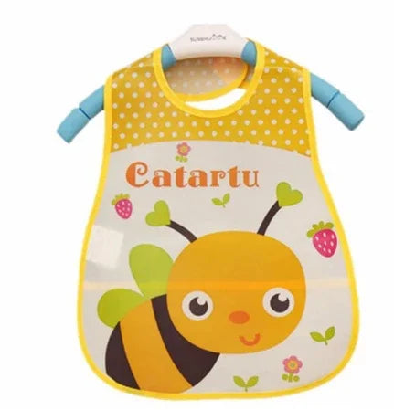 Yellow baby bib with bee illustration, polka dots, strawberries, and 'Catartu' text