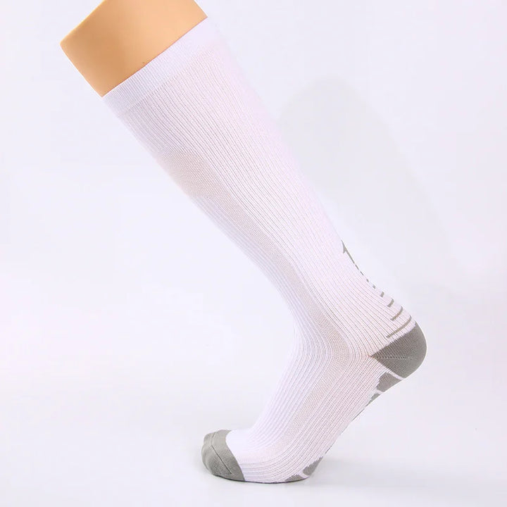White knee-high ribbed sock with gray toe and heel on mannequin foot