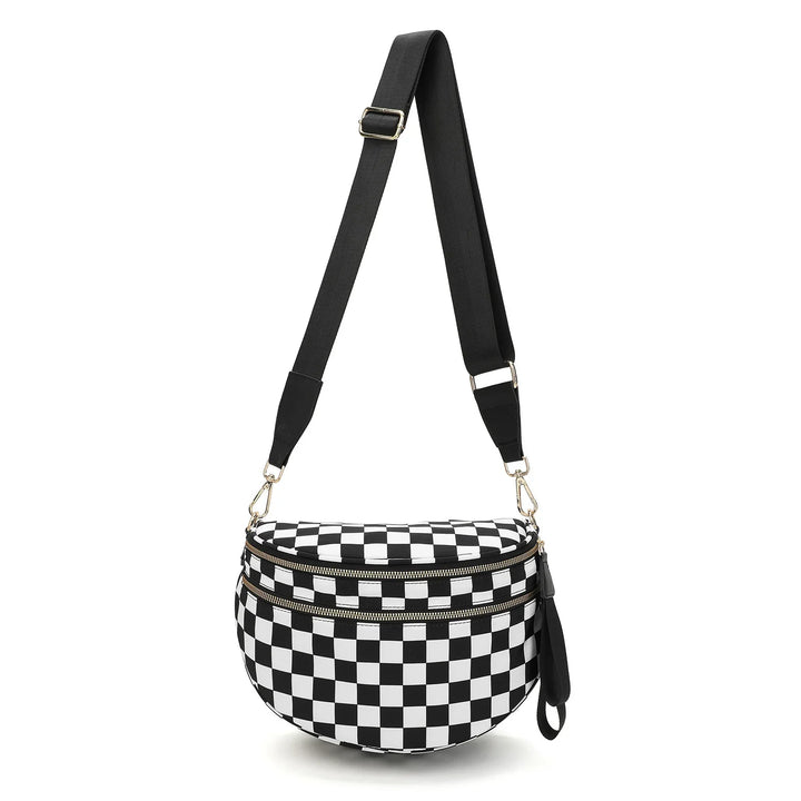 Black and white checkered pattern crossbody bag with adjustable black strap and gold zippers