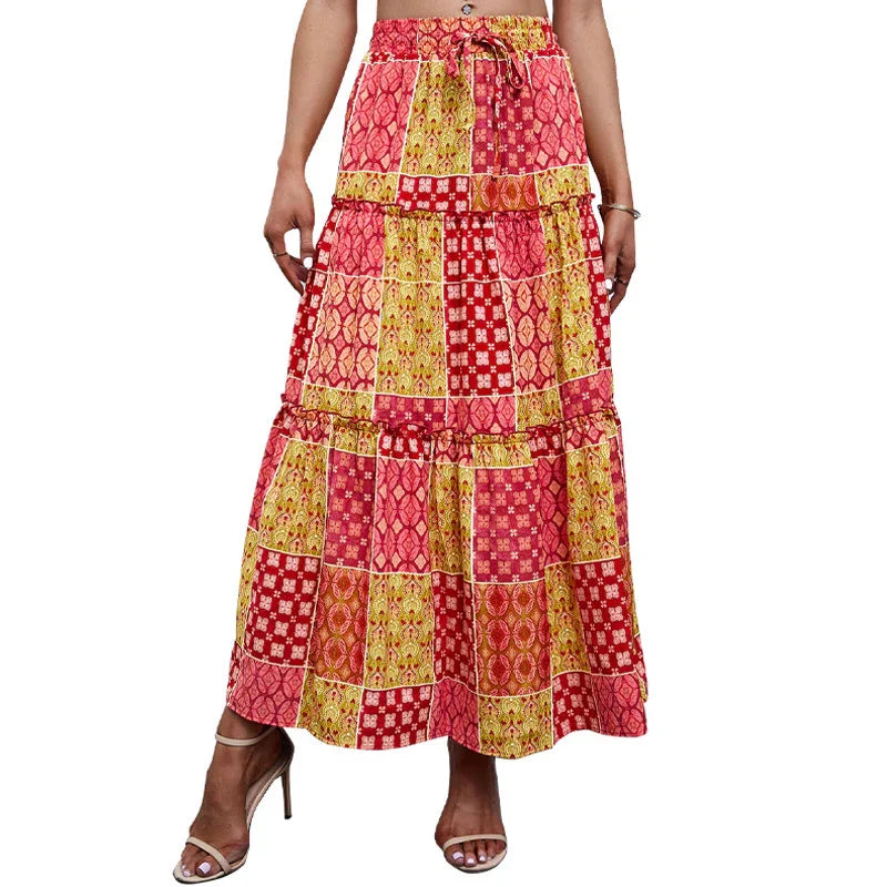 Women wearing multicolor patchwork print boho midi skirt with ruffle tiers and drawstring waist