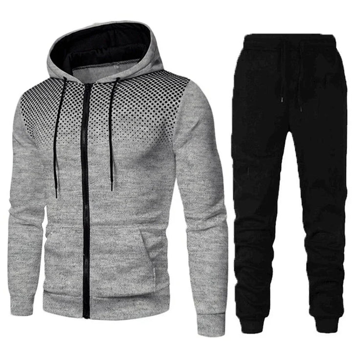 Men's casual two-piece outfit with gray zip-up hoodie featuring black dot pattern and black jogger pants