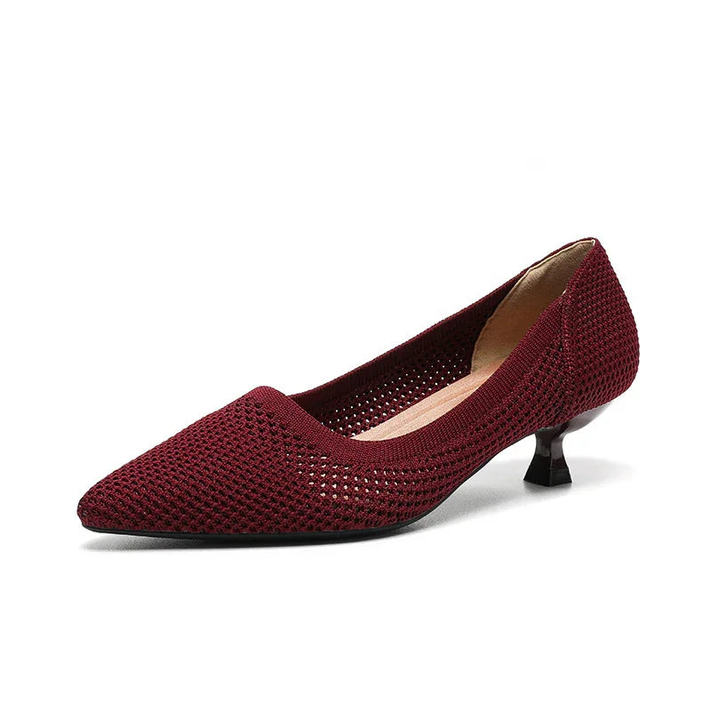 Burgundy knit pointed toe kitten heel shoe with low black heel on white background