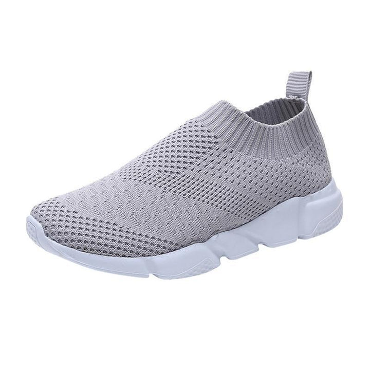gray knitted slip-on sneaker with white chunky sole and pull tab