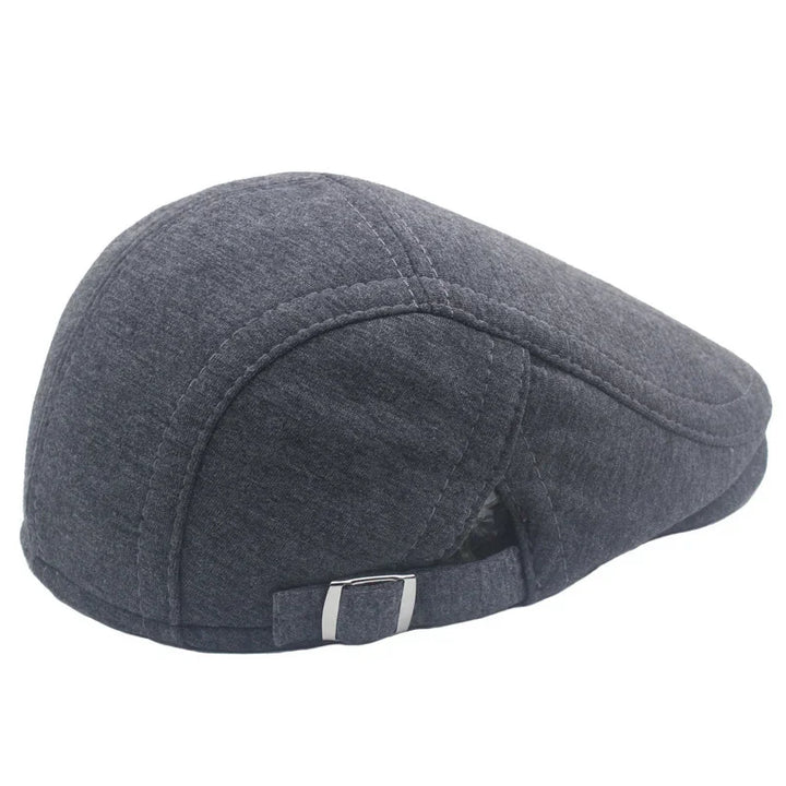 Dark gray flat cap with adjustable buckle strap, classic menswear accessory