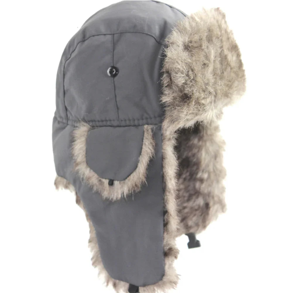 Grey winter trapper hat with faux fur lining and ear flaps for cold weather