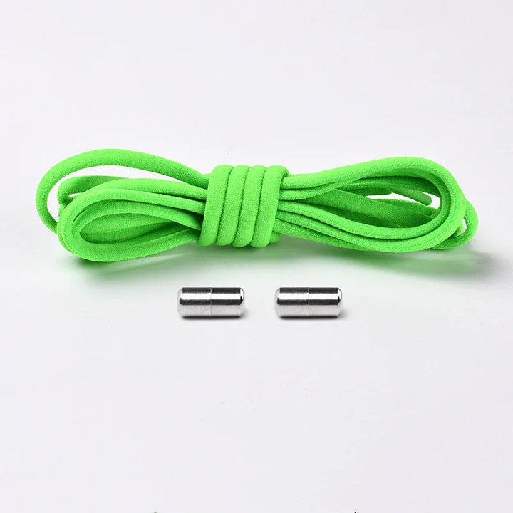 Neon green elastic shoelace with two silver metal aglets on a white background