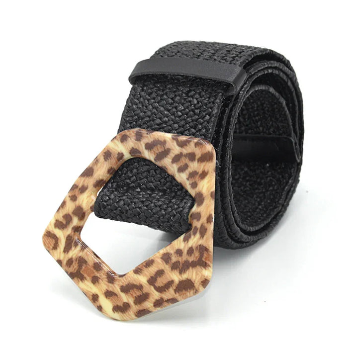 Black woven belt with a leopard print geometric buckle on white background