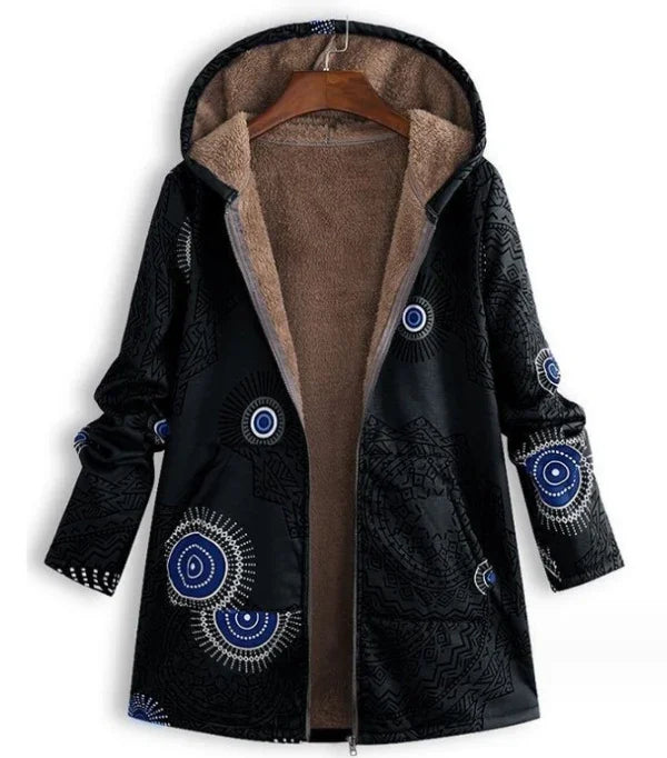 Black hooded winter coat with blue and white circular patterns and soft brown fleece lining