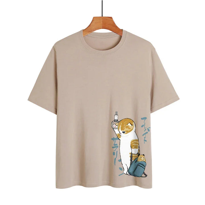 Beige t-shirt with cute cartoon cat holding a phone and a small animal in a backpack, Japanese text