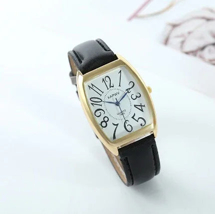 Elegant wristwatch with black leather strap and gold-tone case featuring large distorted Arabic numerals
