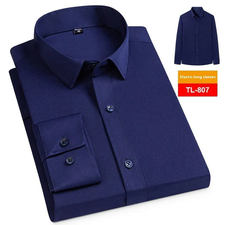 Folded navy blue dress shirt with elastic long sleeves, button-up front, and TL-807 label