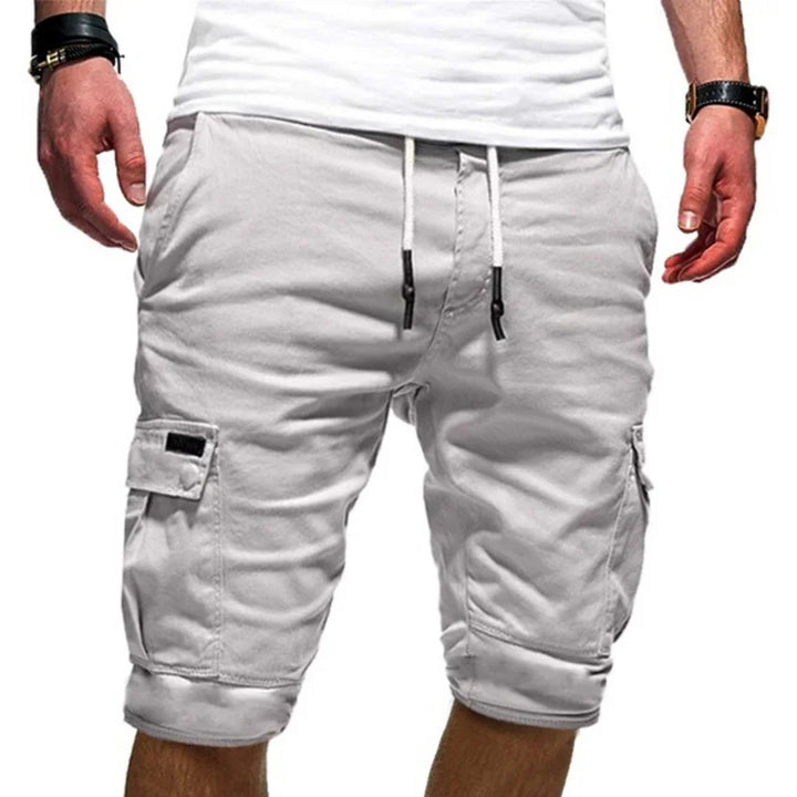 Men's white cargo shorts with drawstring waist and side pockets, casual summer style