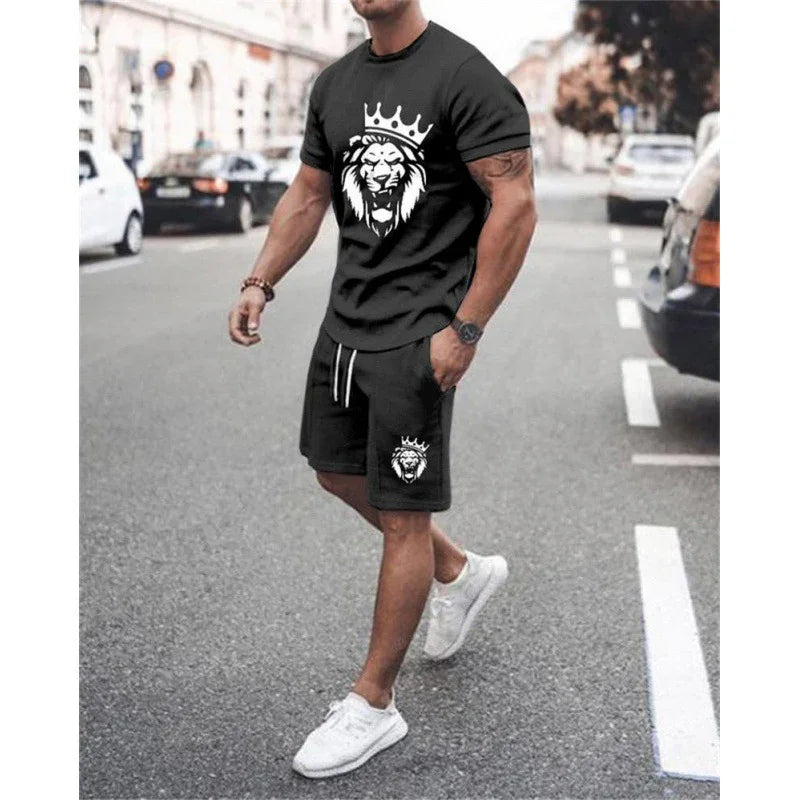 Man wearing black casual T-shirt and shorts set with white crowned lion graphic, walking on city street