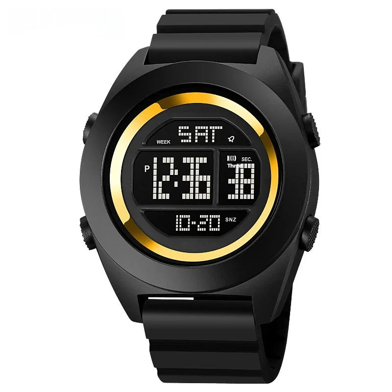 Black digital sports watch with round face, gold accent ring, rubber strap, and time display