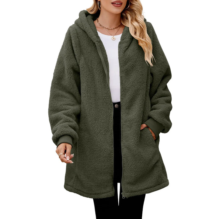 Woman wearing olive green plush fleece zip-up hooded jacket with pockets
