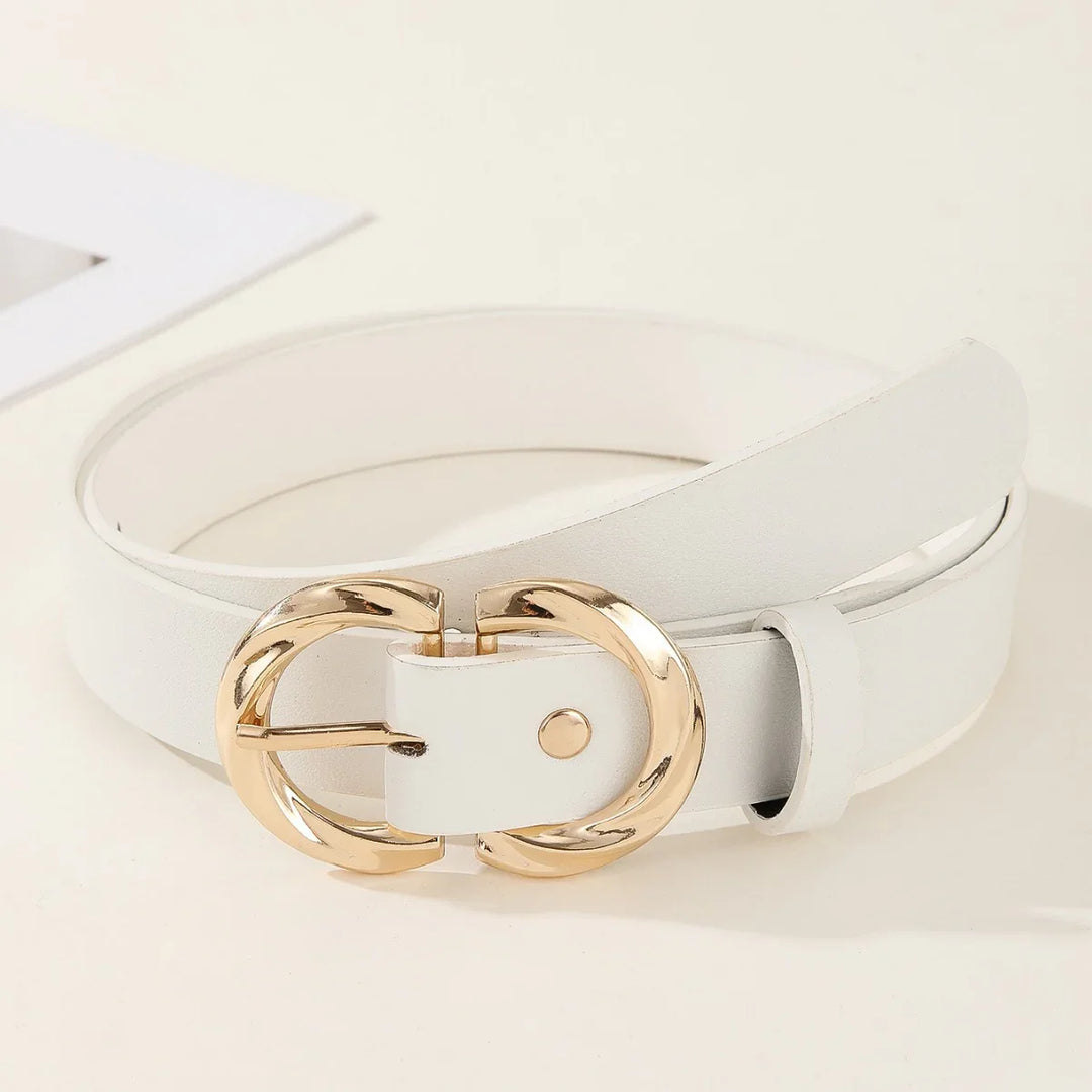 White leather belt with a shiny gold double ring buckle on beige background