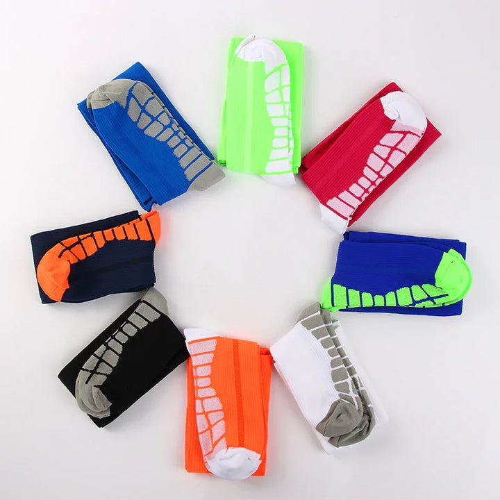 Circle of colorful athletic socks with heel and toe patterns on white background