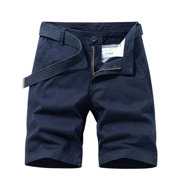 Navy blue casual men's shorts with zipper, button closure, and fabric belt on white background
