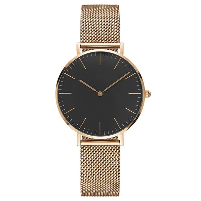 Elegant rose gold mesh strap watch with minimalist black dial and gold hour markers