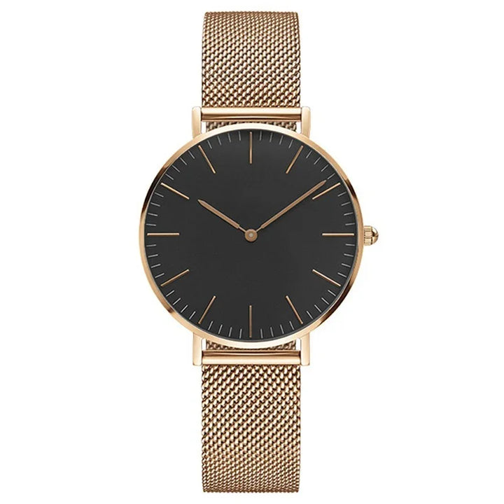 Elegant rose gold mesh strap watch with minimalist black dial and gold hour markers