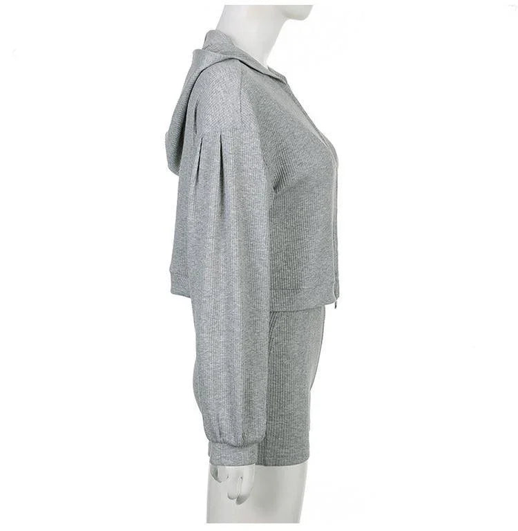 Side view of gray ribbed knit hoodie and shorts set on mannequin against white background