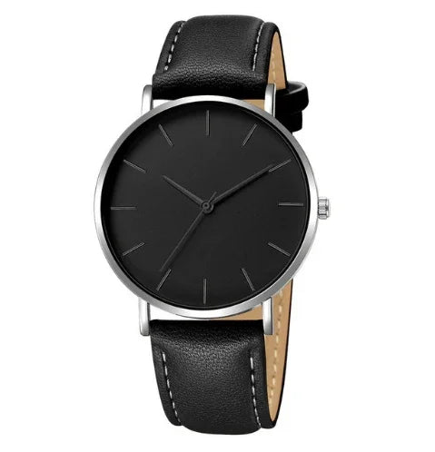 Minimalist black dial wristwatch with silver case and black leather strap with white stitching
