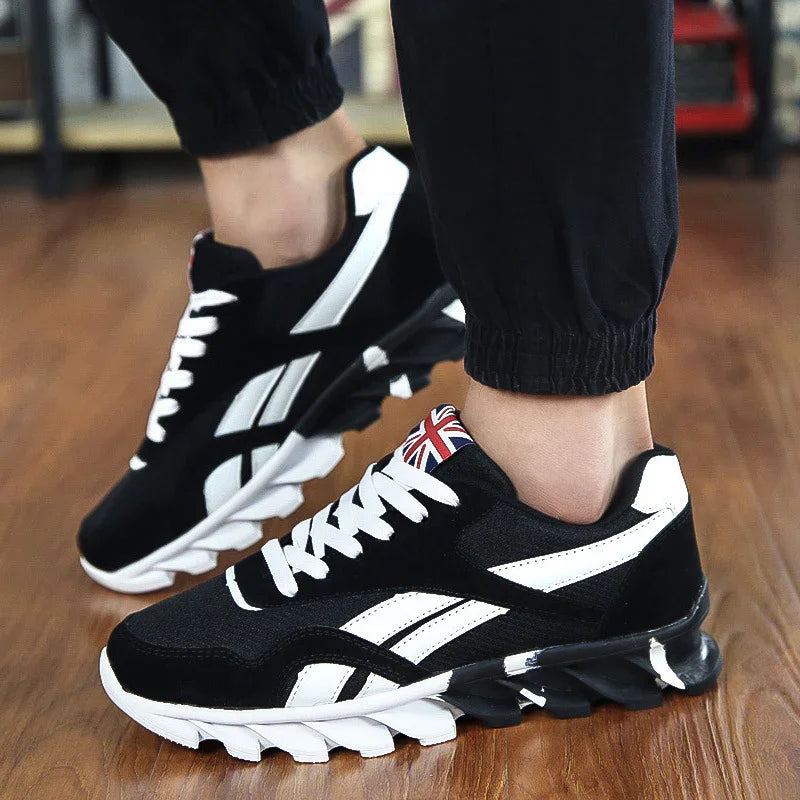 Black and white athletic sneakers with Union Jack detail worn on wooden floor