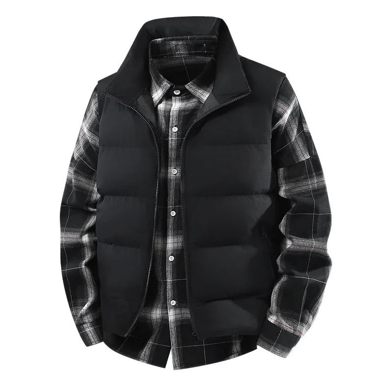 Black padded vest layered over black and white plaid button-up shirt